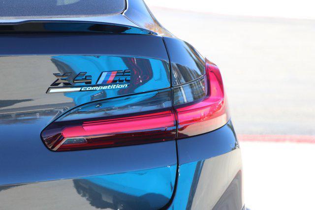 new 2025 BMW X4 M car, priced at $93,275