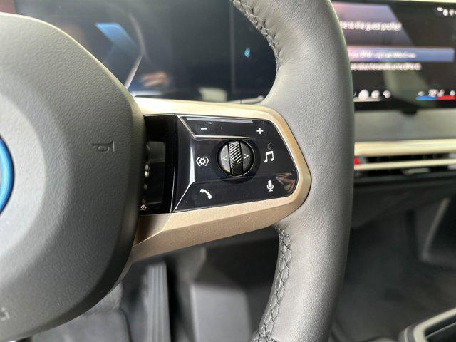 used 2024 BMW iX car, priced at $72,917