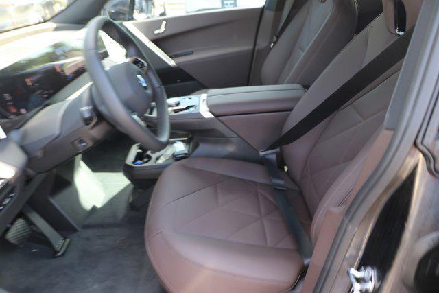 new 2026 BMW iX car, priced at $83,025
