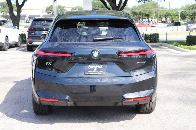 new 2026 BMW iX car, priced at $83,025