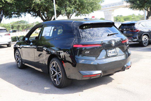 new 2026 BMW iX car, priced at $83,025