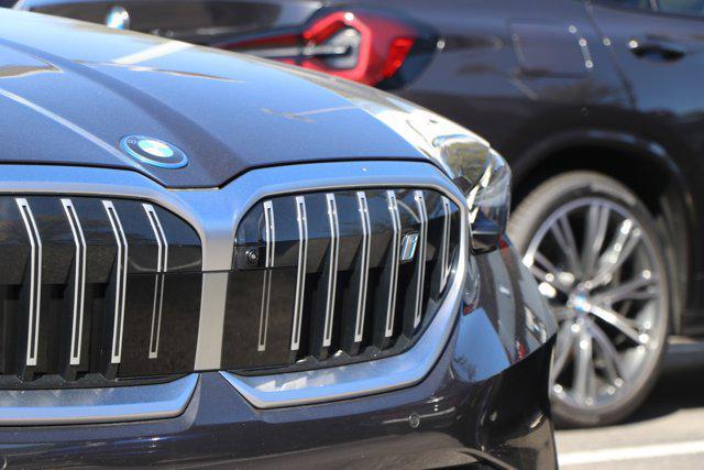 used 2025 BMW i5 car, priced at $63,917