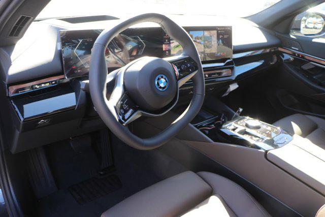 used 2025 BMW i5 car, priced at $63,917