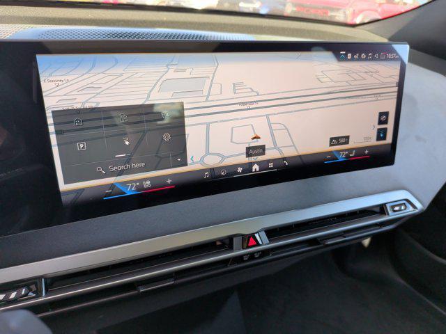 new 2026 BMW iX car, priced at $90,070