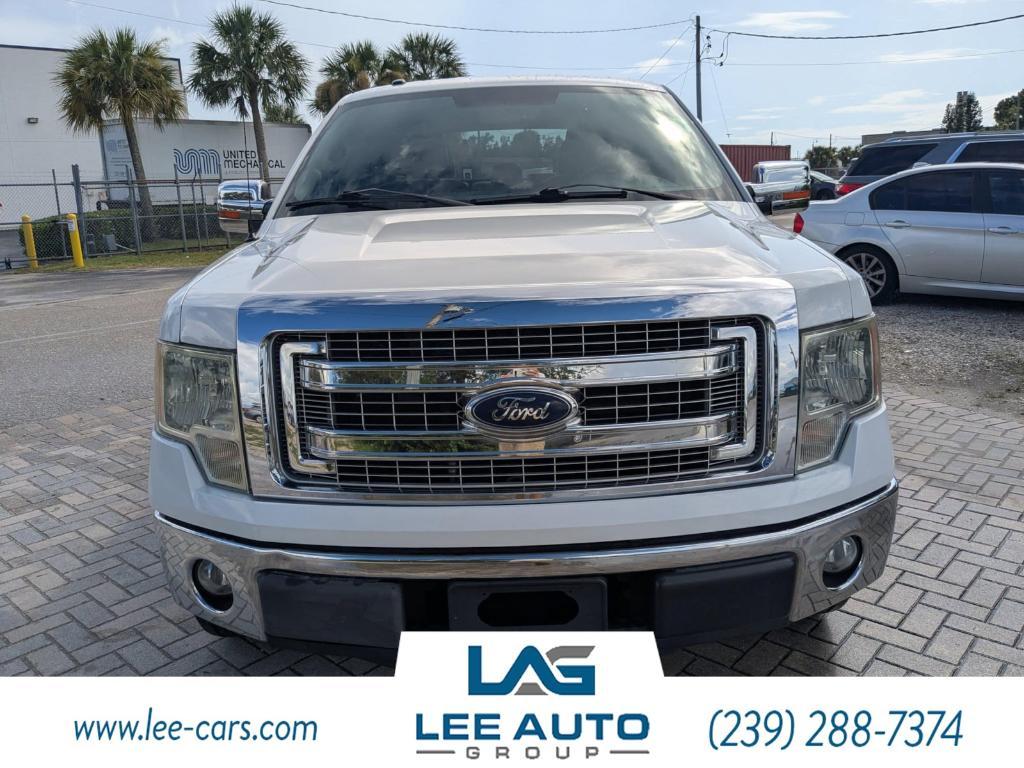 used 2014 Ford F-150 car, priced at $16,000