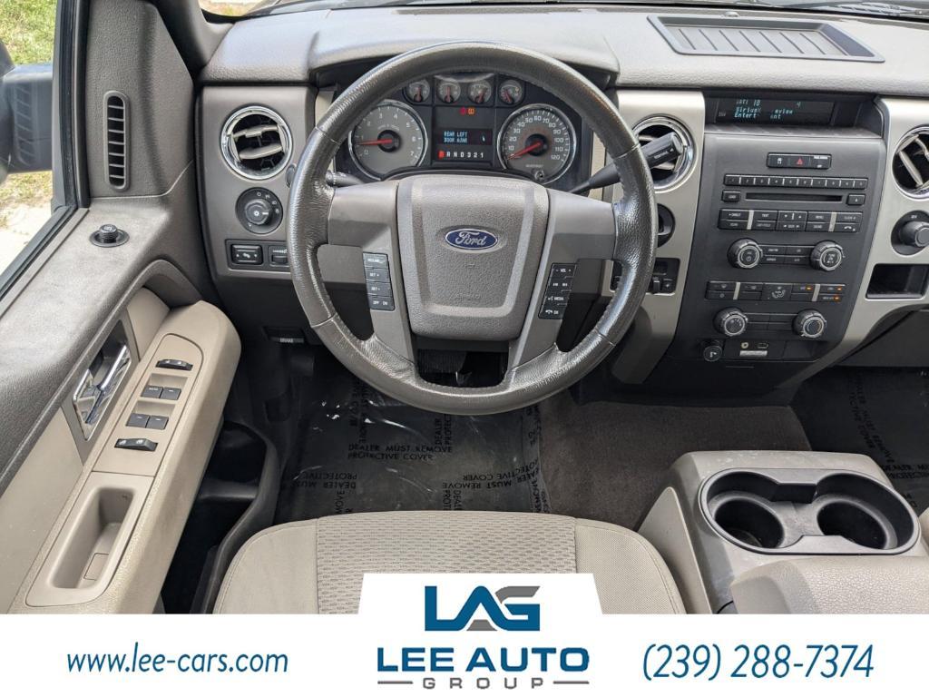 used 2009 Ford F-150 car, priced at $14,000