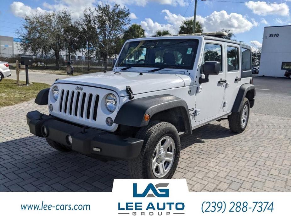 used 2015 Jeep Wrangler Unlimited car, priced at $14,000
