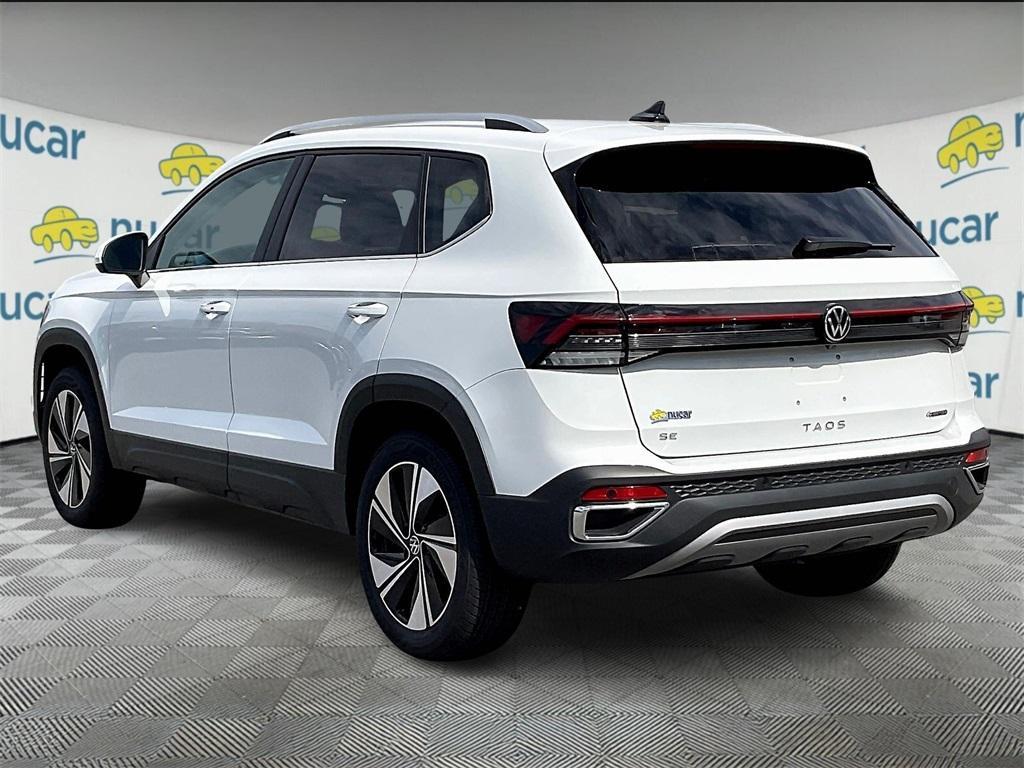 new 2025 Volkswagen Taos car, priced at $30,675