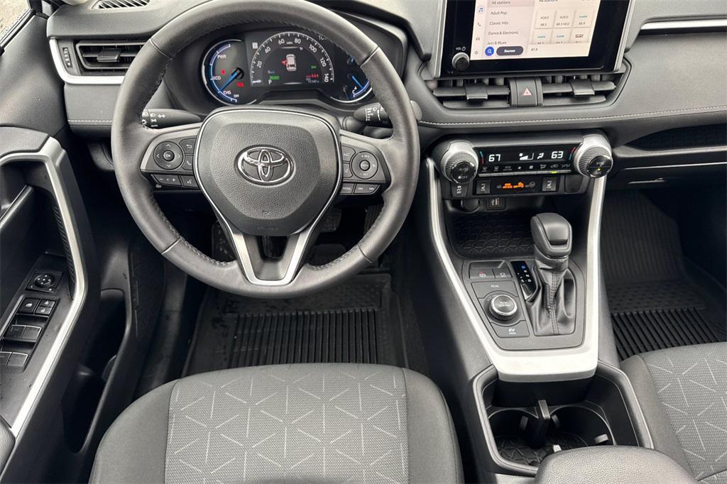 used 2024 Toyota RAV4 Hybrid car, priced at $33,871