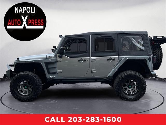 used 2017 Jeep Wrangler Unlimited car, priced at $25,759