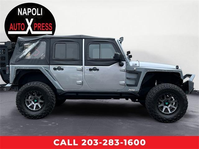 used 2017 Jeep Wrangler Unlimited car, priced at $25,759