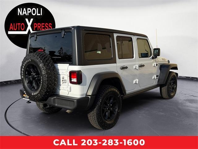 used 2021 Jeep Wrangler Unlimited car, priced at $32,037