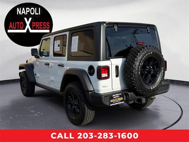 used 2021 Jeep Wrangler Unlimited car, priced at $32,037