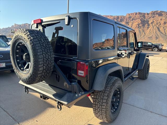 used 2016 Jeep Wrangler Unlimited car, priced at $25,536