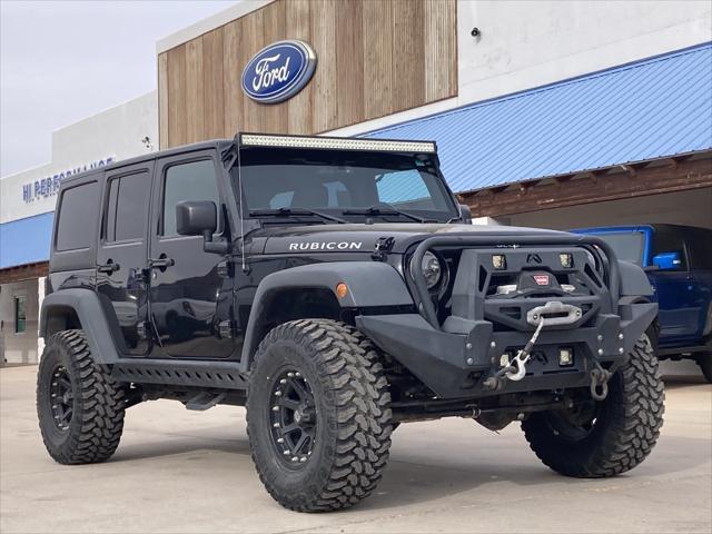 used 2016 Jeep Wrangler Unlimited car, priced at $25,536