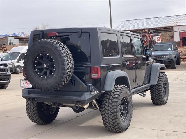 used 2016 Jeep Wrangler Unlimited car, priced at $25,536