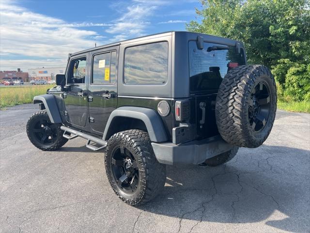 used 2015 Jeep Wrangler Unlimited car, priced at $23,944