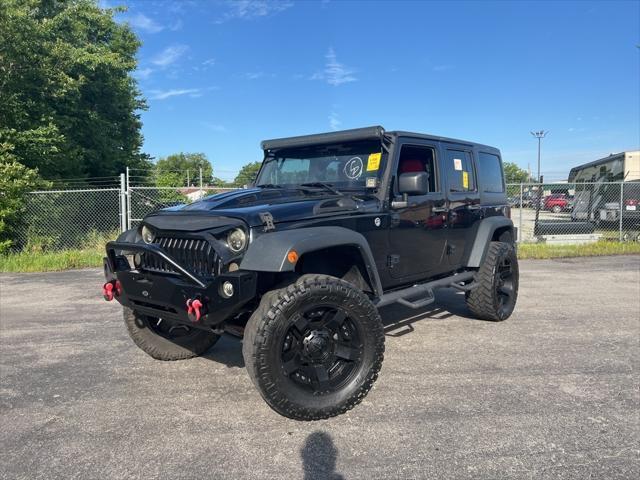 used 2015 Jeep Wrangler Unlimited car, priced at $23,944