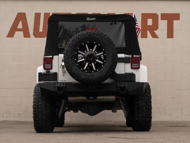 used 2016 Jeep Wrangler Unlimited car, priced at $26,144