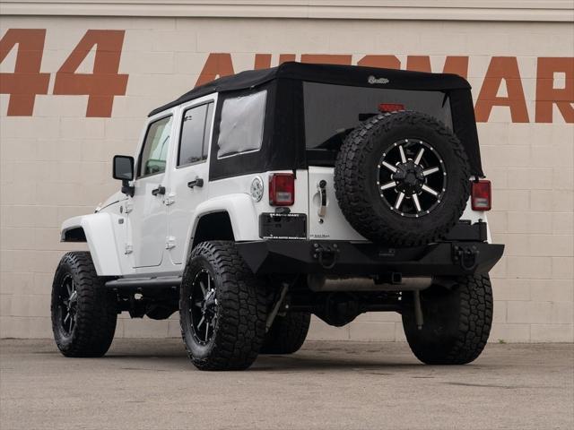 used 2016 Jeep Wrangler Unlimited car, priced at $26,144