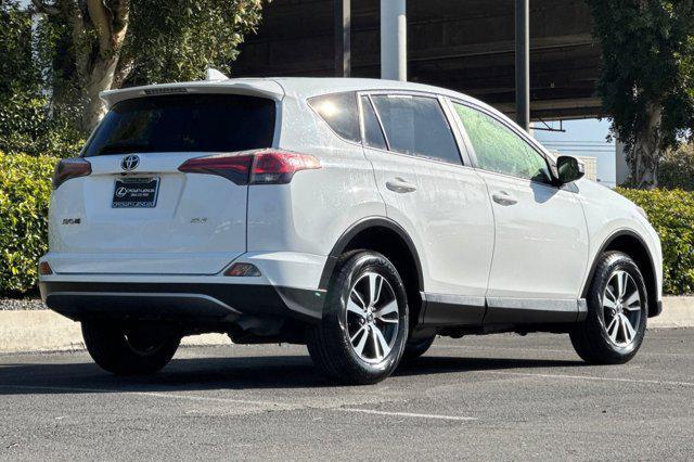 used 2018 Toyota RAV4 car, priced at $17,999