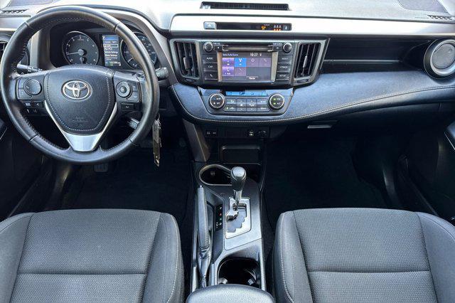used 2018 Toyota RAV4 car, priced at $17,999