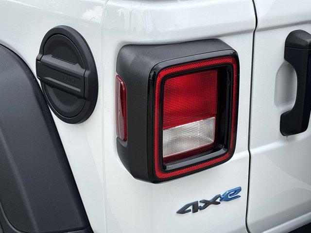 used 2023 Jeep Wrangler 4xe car, priced at $27,588