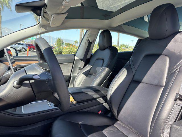 used 2023 Tesla Model 3 car, priced at $25,999