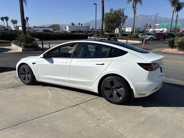 used 2023 Tesla Model 3 car, priced at $25,999