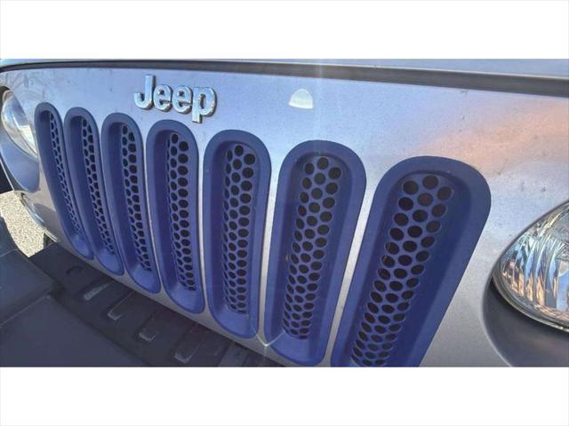 used 2014 Jeep Wrangler Unlimited car, priced at $21,487