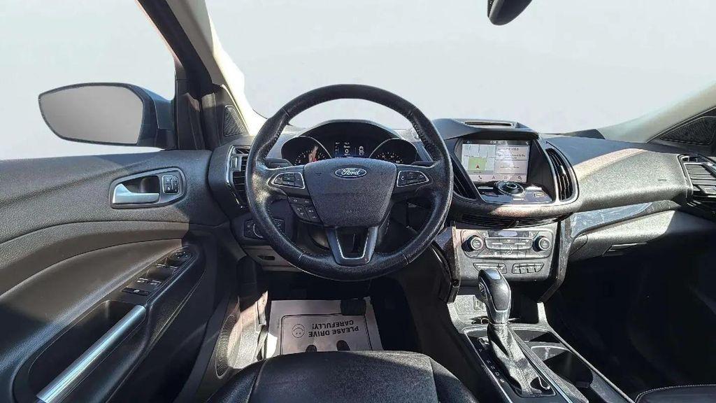 used 2018 Ford Escape car, priced at $13,988
