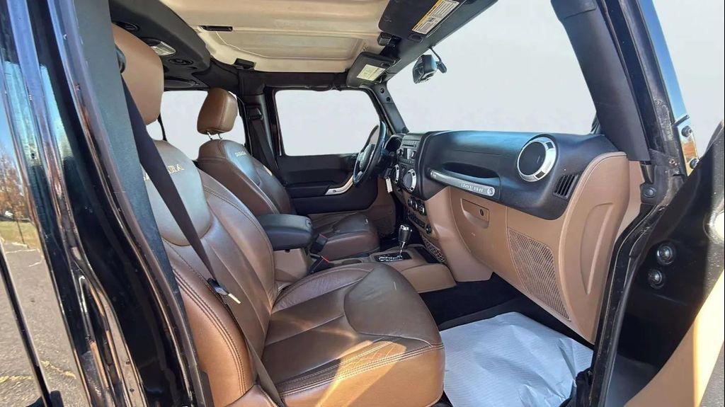 used 2014 Jeep Wrangler Unlimited car, priced at $15,500