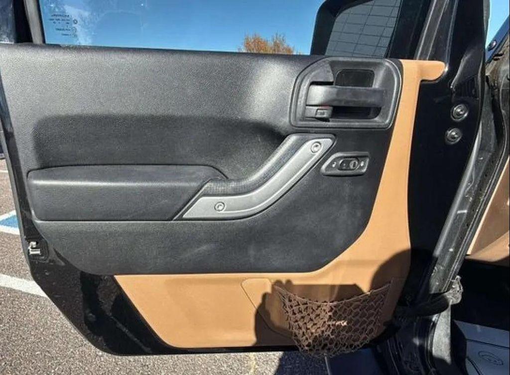 used 2014 Jeep Wrangler Unlimited car, priced at $15,500