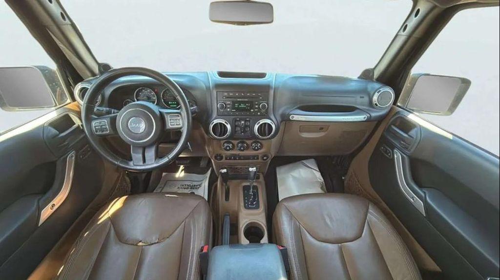 used 2014 Jeep Wrangler Unlimited car, priced at $15,500