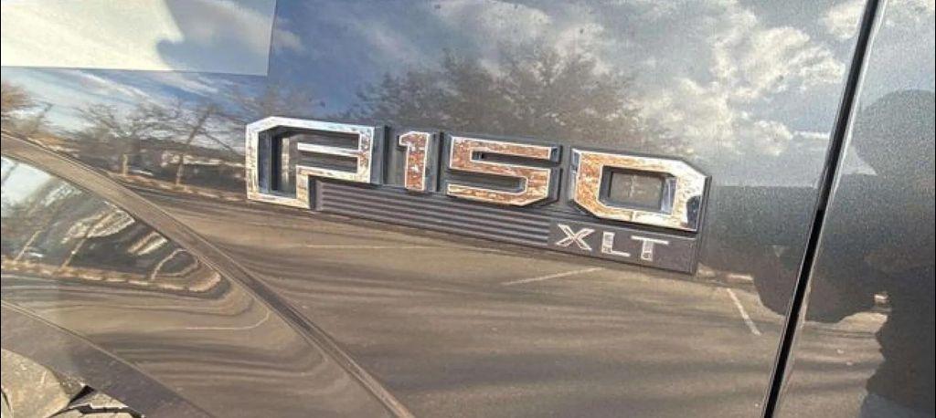 used 2018 Ford F-150 car, priced at $18,988