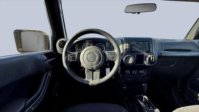 used 2015 Jeep Wrangler Unlimited car, priced at $18,988