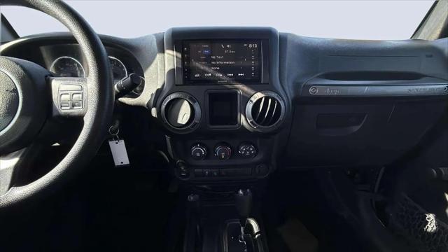 used 2015 Jeep Wrangler Unlimited car, priced at $18,988