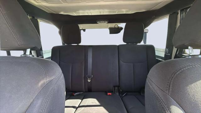 used 2015 Jeep Wrangler Unlimited car, priced at $18,988