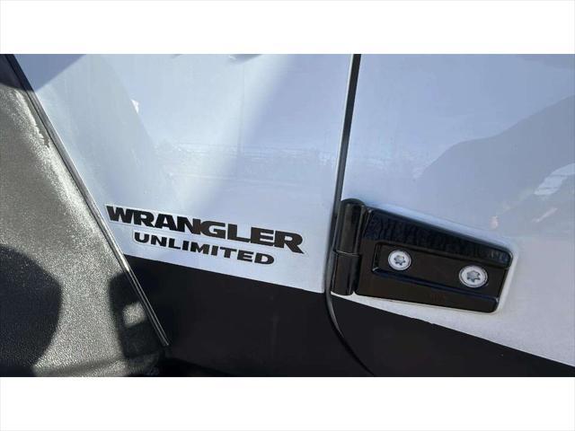 used 2013 Jeep Wrangler Unlimited car, priced at $22,487