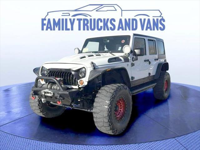 used 2013 Jeep Wrangler Unlimited car, priced at $22,487