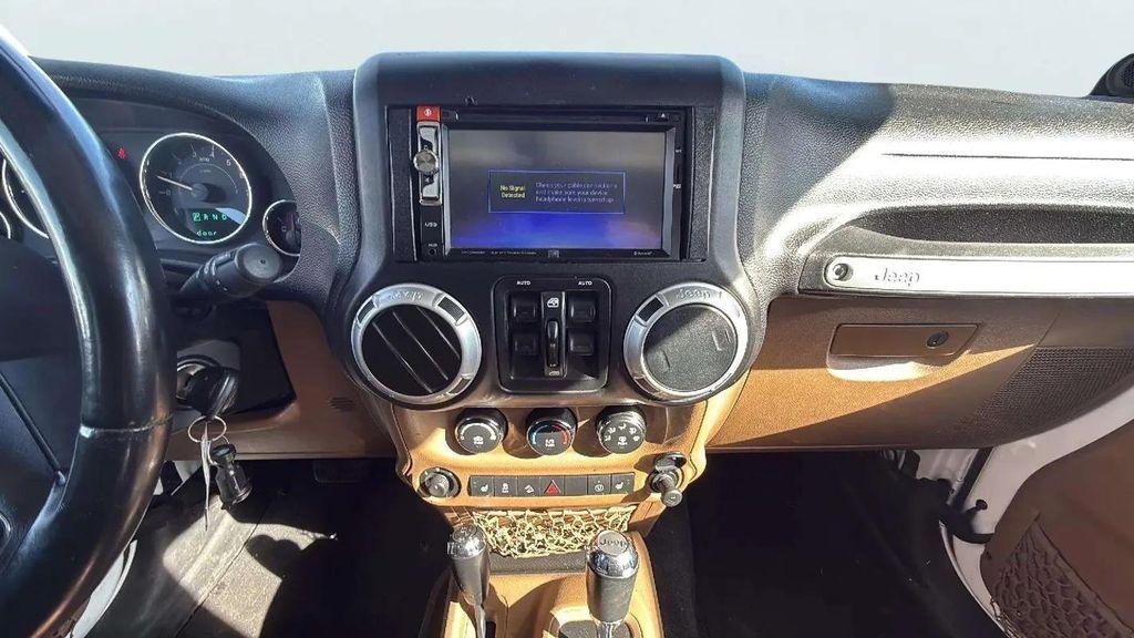 used 2014 Jeep Wrangler Unlimited car, priced at $23,988