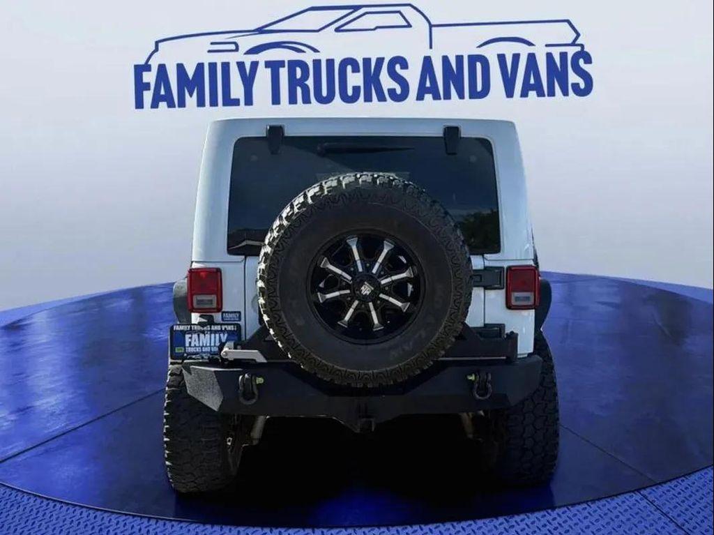used 2014 Jeep Wrangler Unlimited car, priced at $23,988