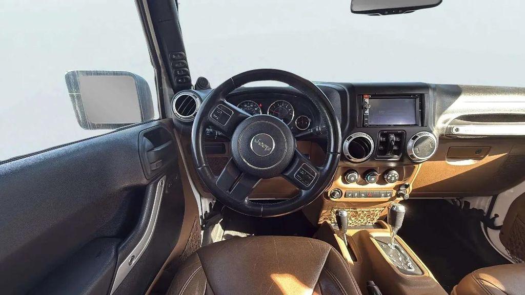 used 2014 Jeep Wrangler Unlimited car, priced at $23,988