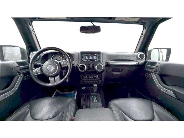 used 2015 Jeep Wrangler Unlimited car, priced at $23,487