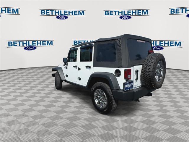 used 2017 Jeep Wrangler Unlimited car, priced at $23,192