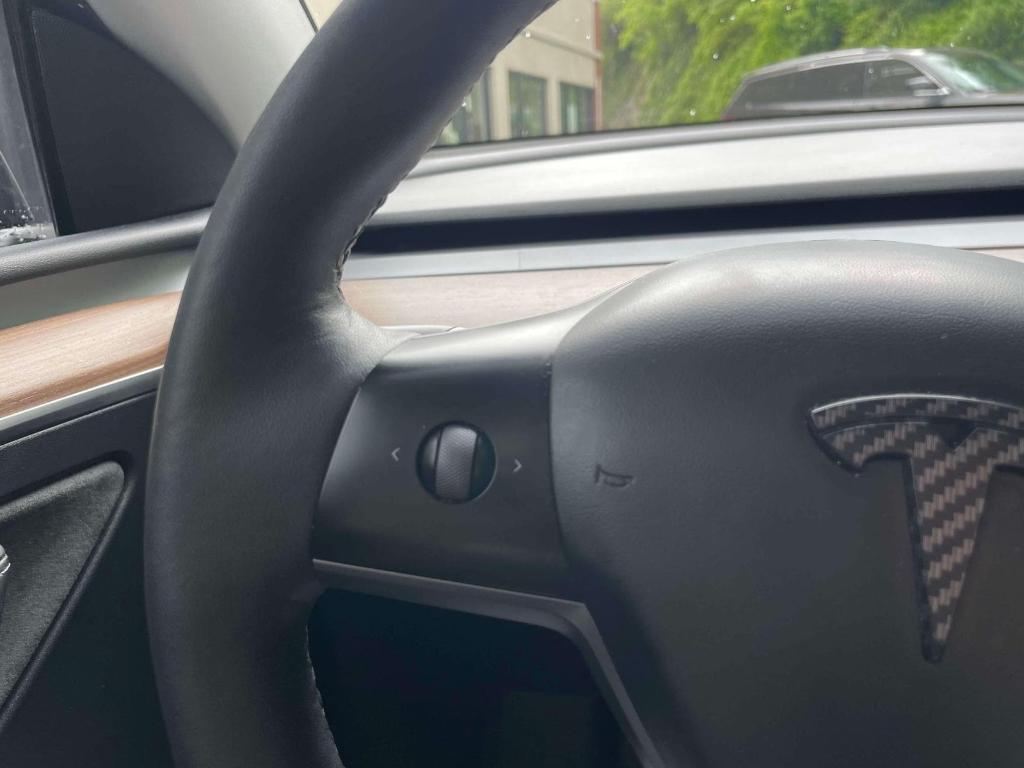 used 2023 Tesla Model Y car, priced at $27,649