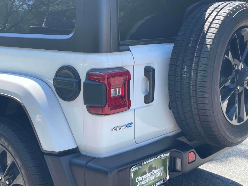 used 2022 Jeep Wrangler Unlimited 4xe car, priced at $30,629