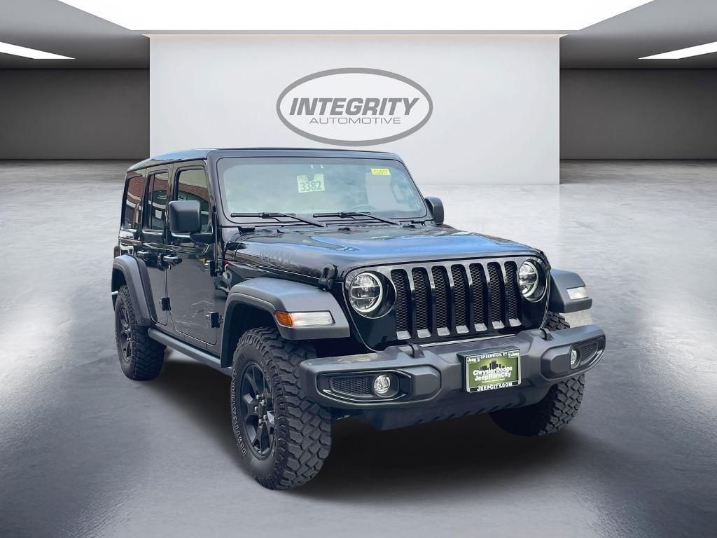 used 2021 Jeep Wrangler Unlimited car, priced at $33,993