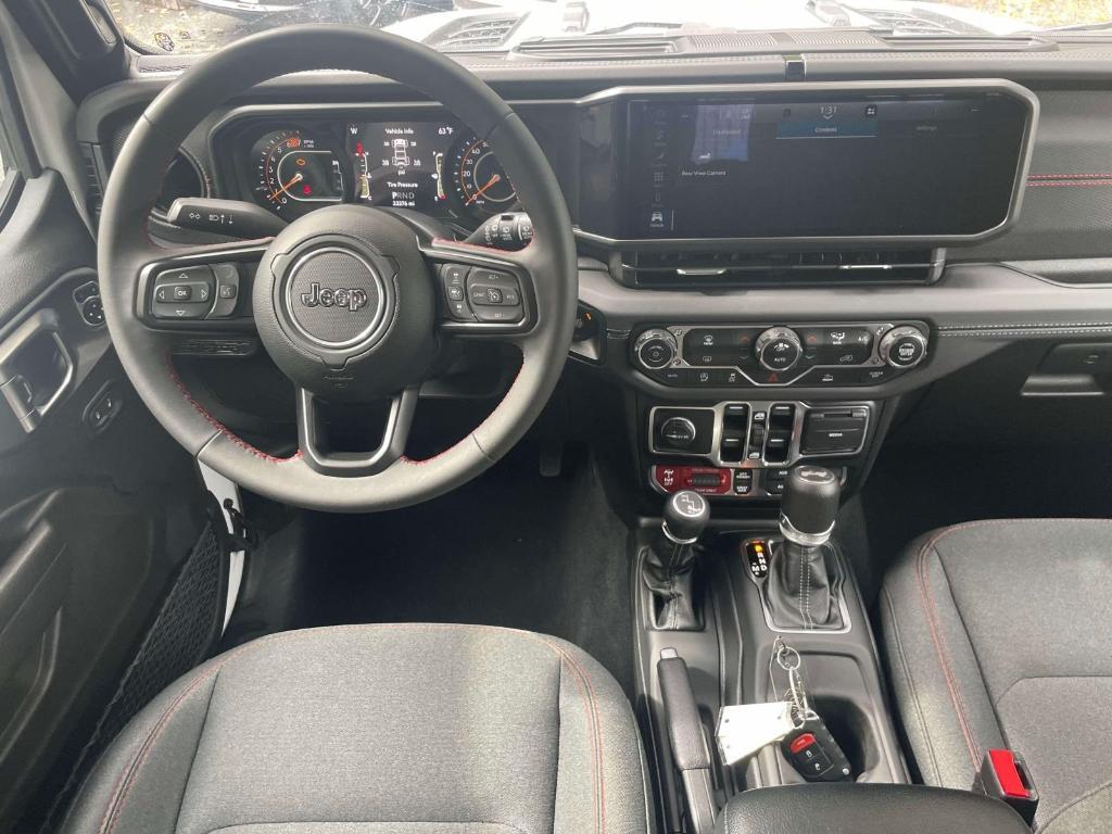 used 2024 Jeep Wrangler car, priced at $43,299