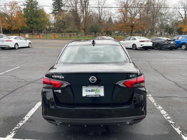 used 2021 Nissan Versa car, priced at $18,999